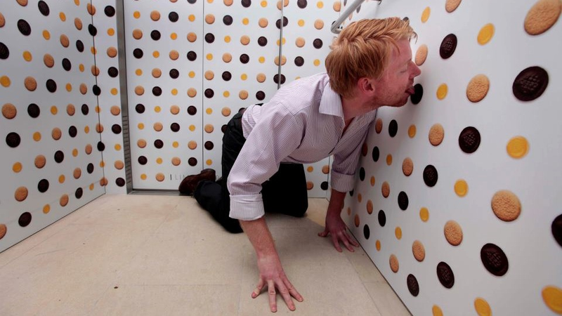 Illustration for article titled The World's Most Disgusting Elevator Has Lickable Cookie Wallpaper